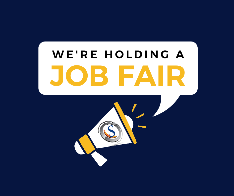 Navy blue background with a white and yellow megaphone shouting "We're holding a job fair" in bold black and gold text. The words are inside of a speech bubble coming out of the megaphone.